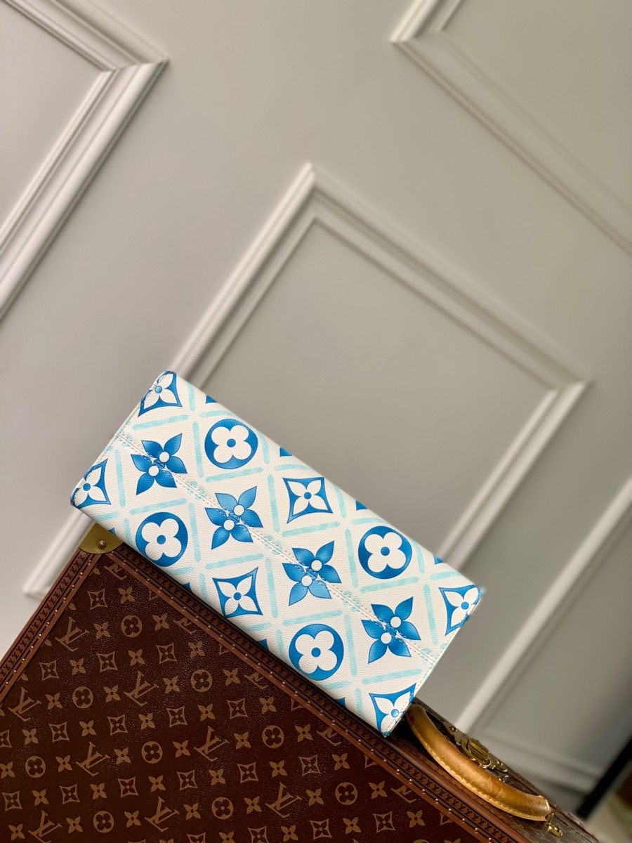 m11262 l**is V*t*n monogram tiles onthego mm handbag