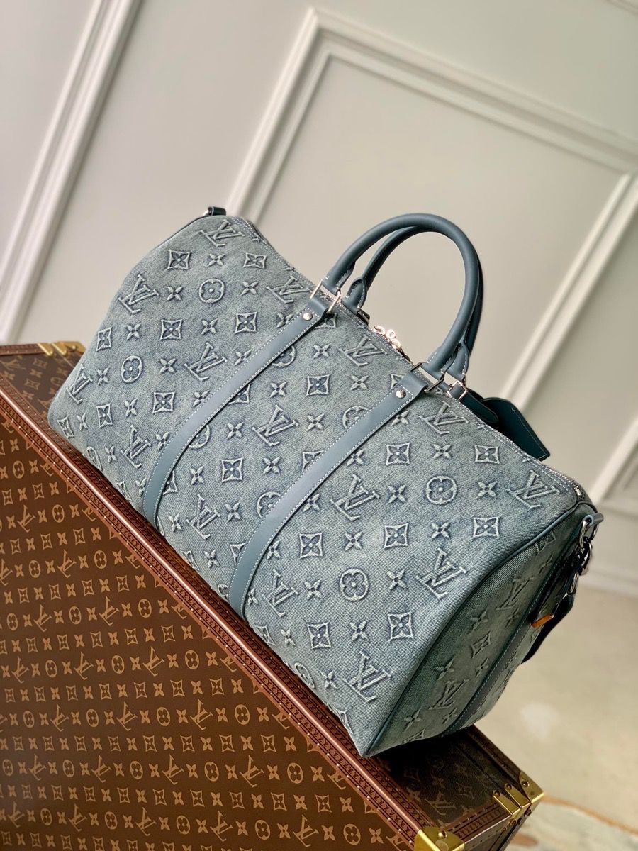 m22532 l**is V*t*n washed denim keepall bandoulière 50 handbag