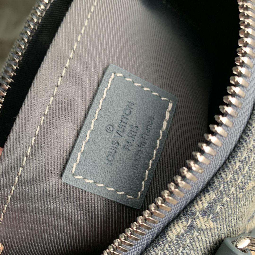 m22762 l**is V*t*n washed denim keepall bandoulière 25 handbag
