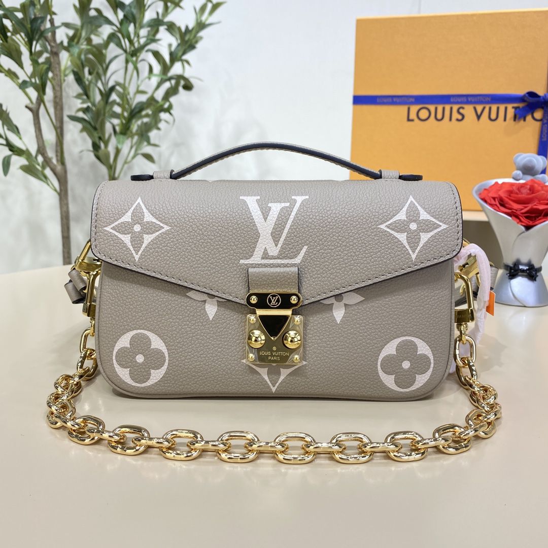 #m23081 l**is V*t*n monogram empreinte pochette métis east west