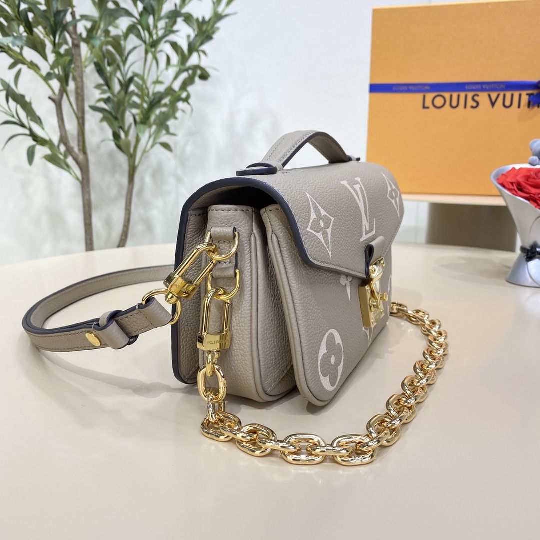 #m23081 l**is V*t*n monogram empreinte pochette métis east west