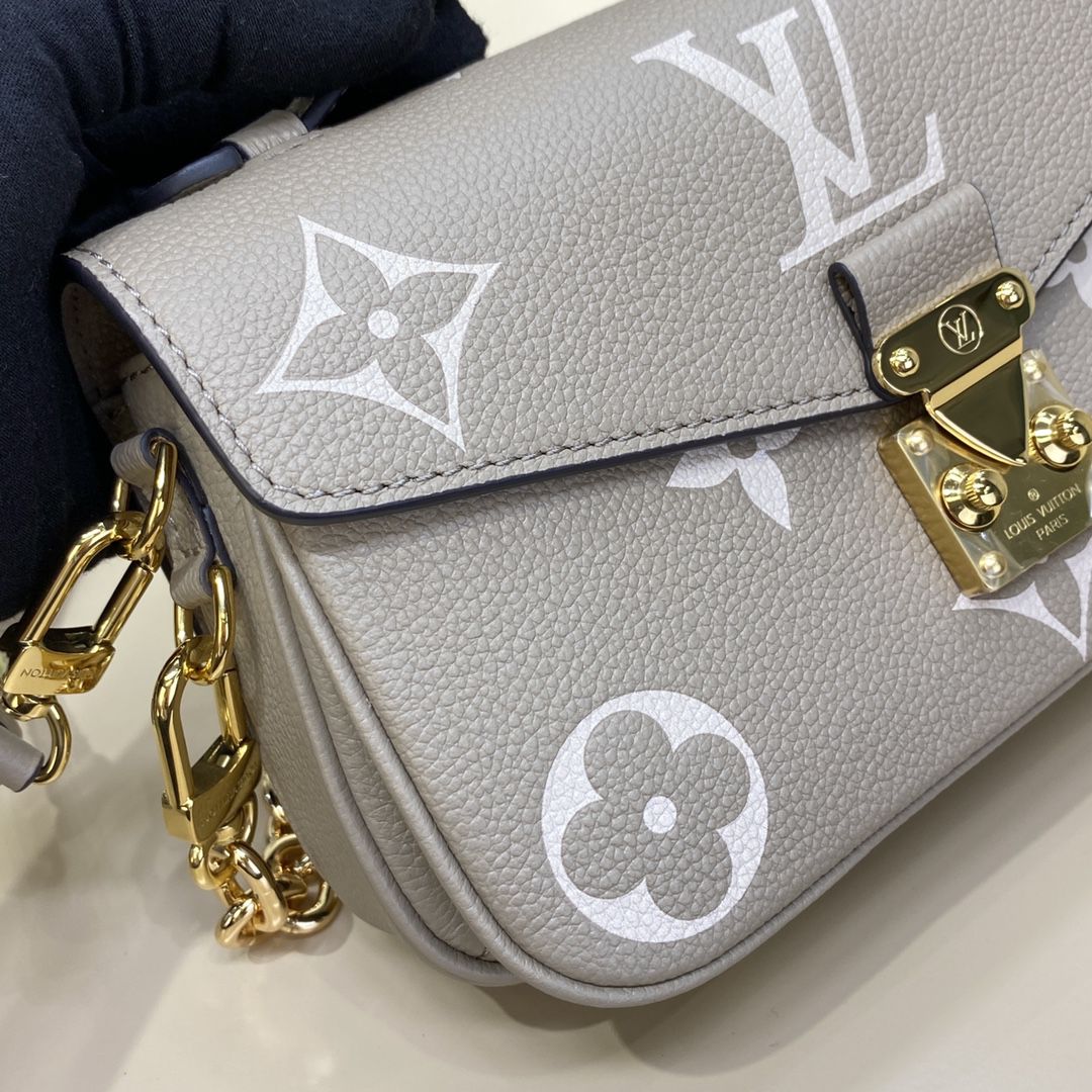 #m23081 l**is V*t*n monogram empreinte pochette métis east west