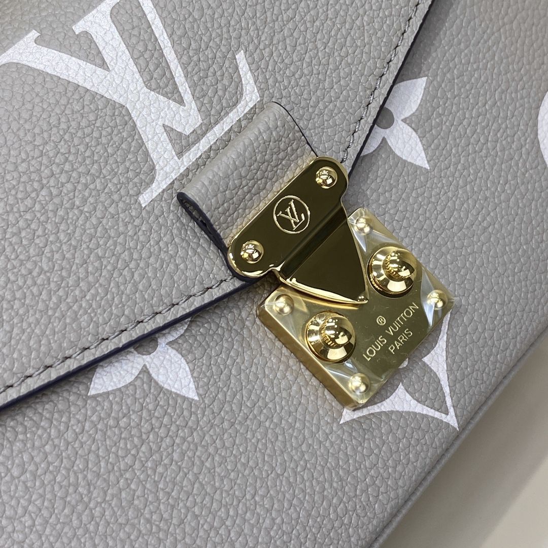 #m23081 l**is V*t*n monogram empreinte pochette métis east west