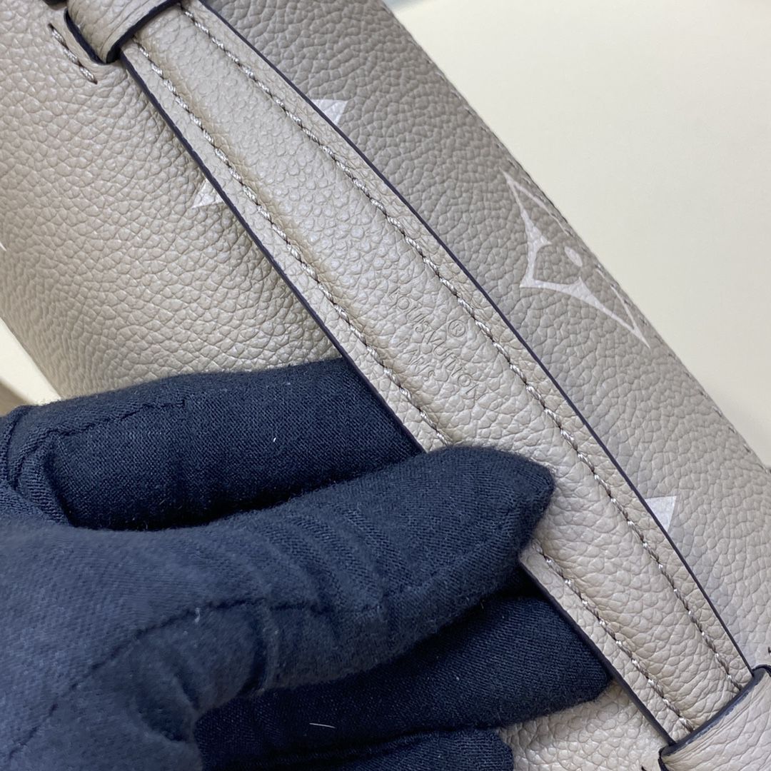 #m23081 l**is V*t*n monogram empreinte pochette métis east west