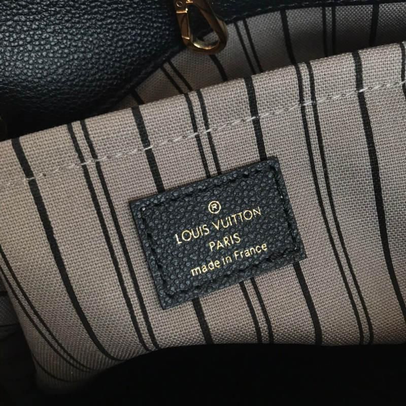 #m41048 l**is V*t*n monogram empreinte montaigne mm-noir