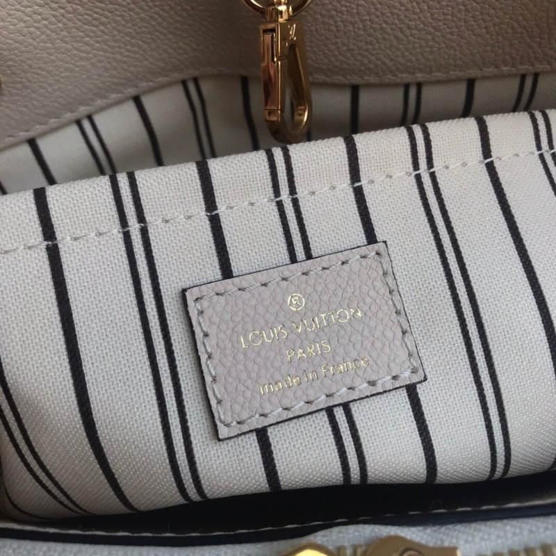 #m44061 l**is V*t*n monogram empreinte montaigne mm-cream