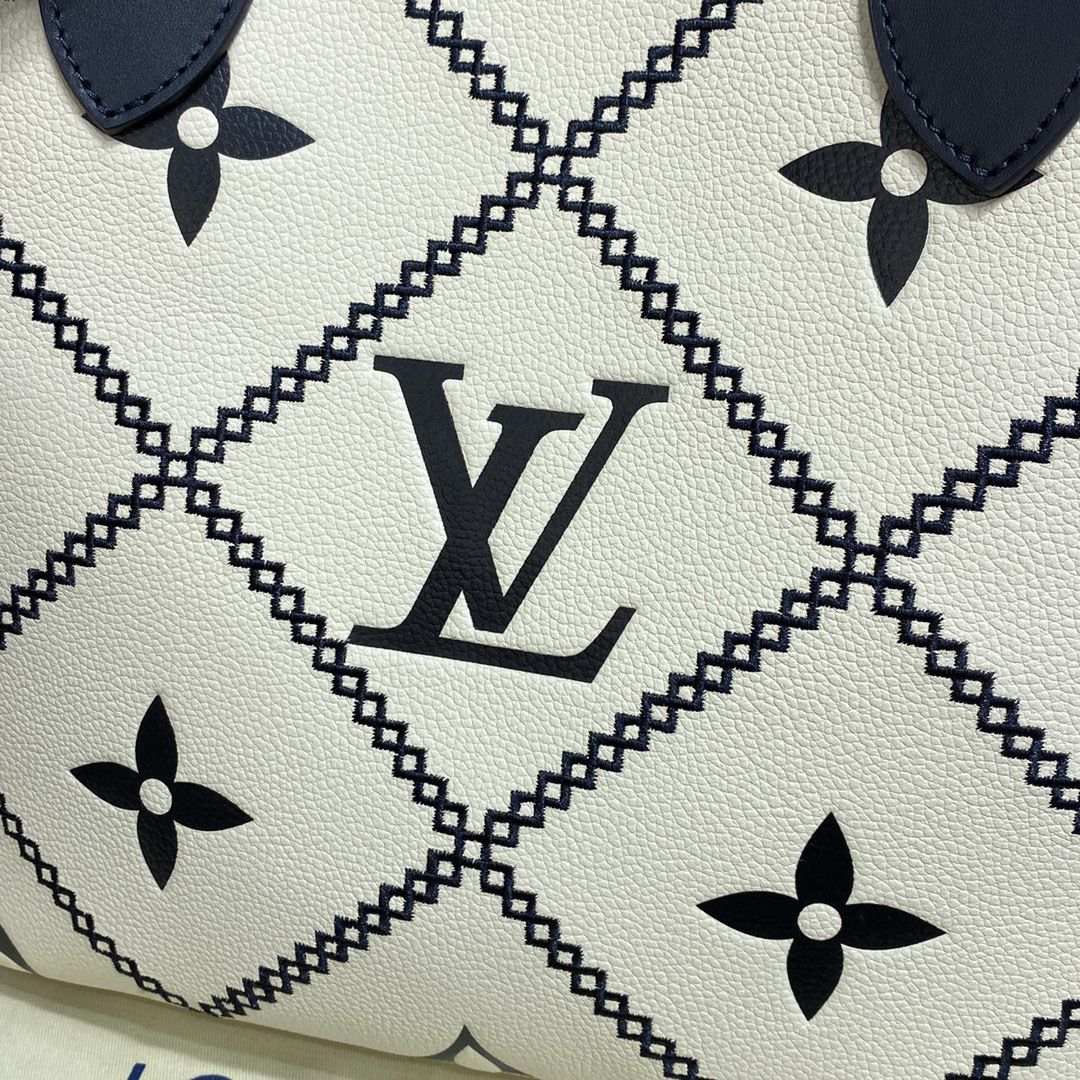 #m46039 l**is V*t*n monogram empreinte neverfull mm tote bag