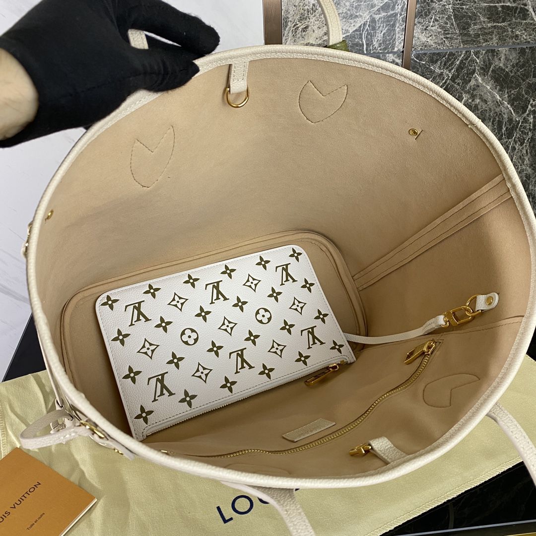 #m46102 l**is V*t*n monogram empreinte neverfull mm