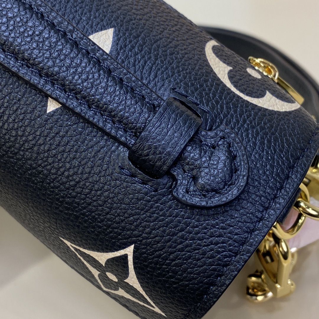 #m46596 l**is V*t*n monogram empreinte pochette métis east west